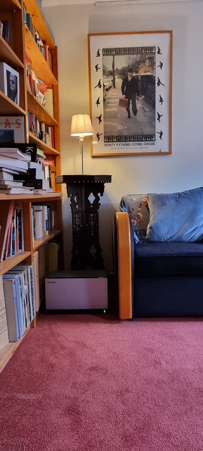 Battery beside a sofa